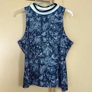 Women’s sleeveless golf/sports shirt. Lightweight fabric, very stretch-able.